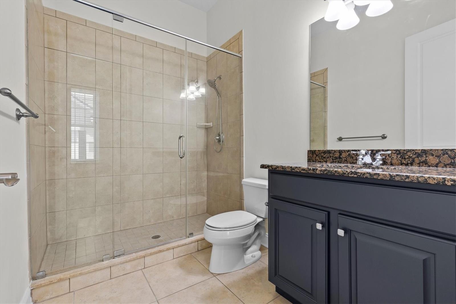 Full bath w/ shower serves in-law suite.
