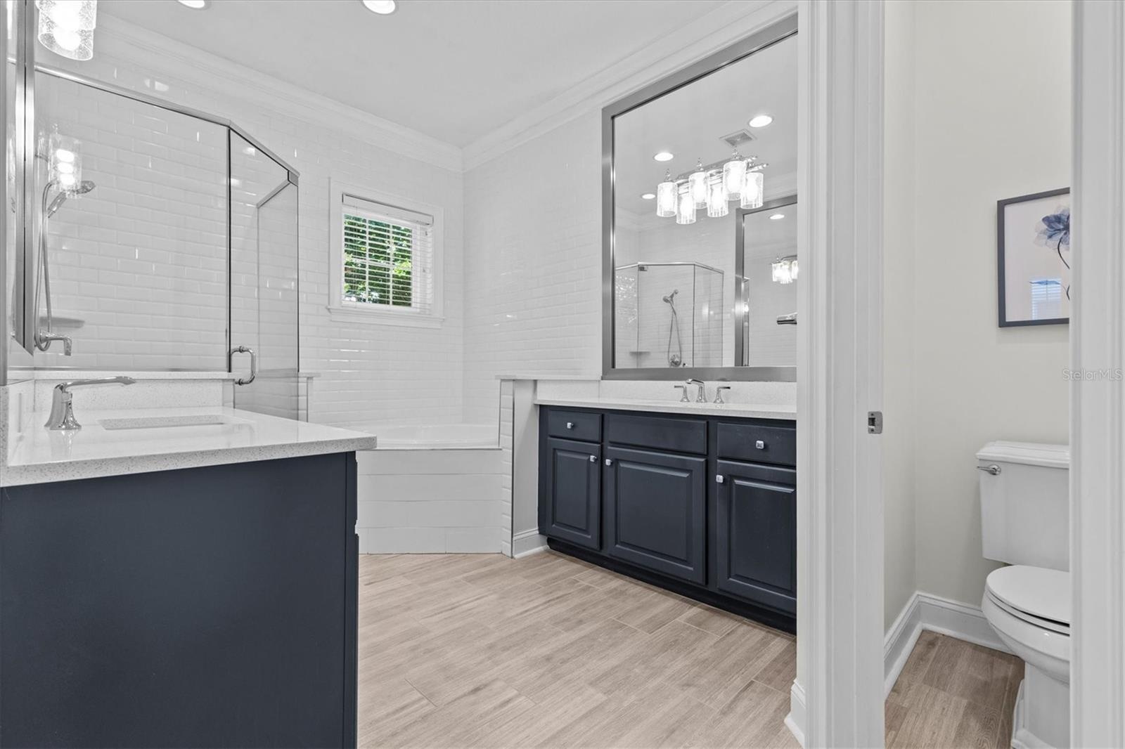 owner's en-suite bath with garden tub and shower