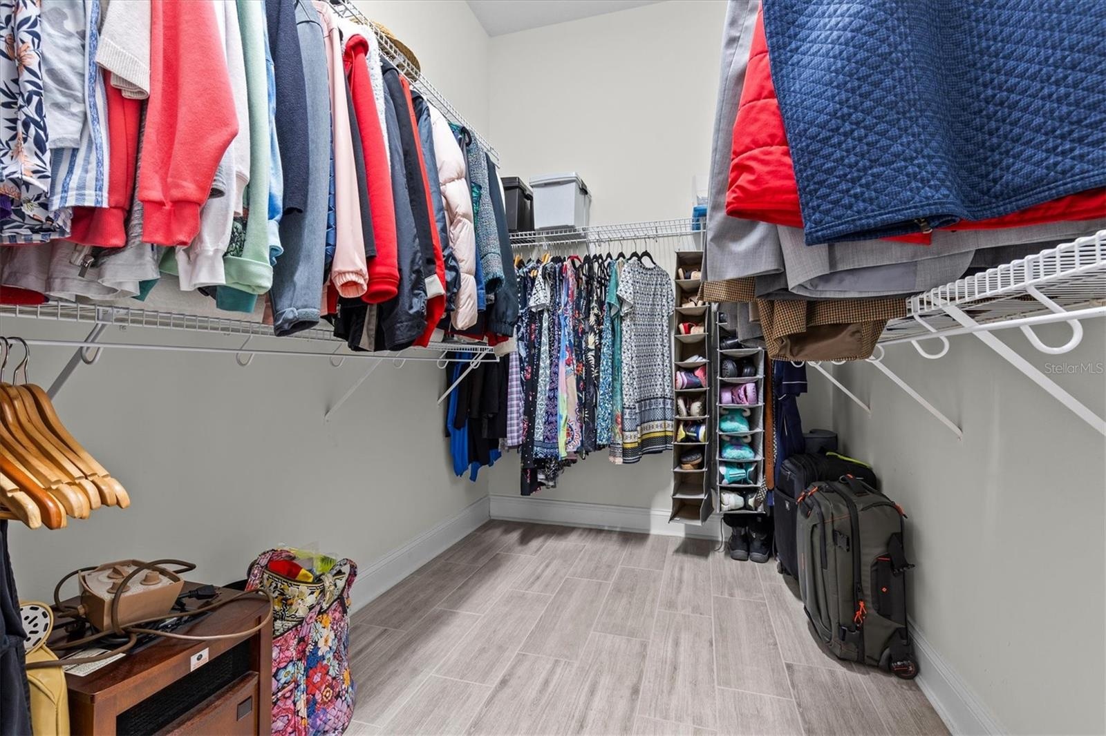 One of two large walk-in closets in Owner's suite.