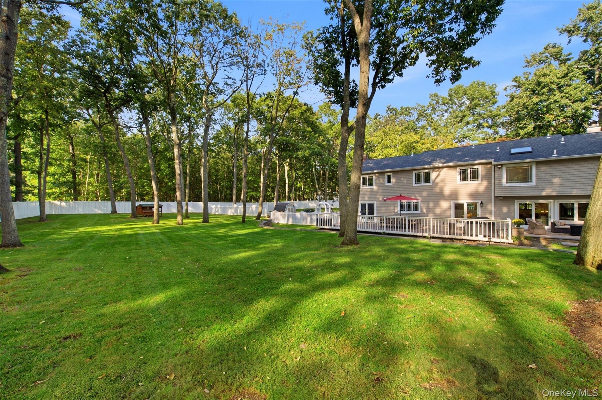 The yard is flat and completely fenced in and very private.