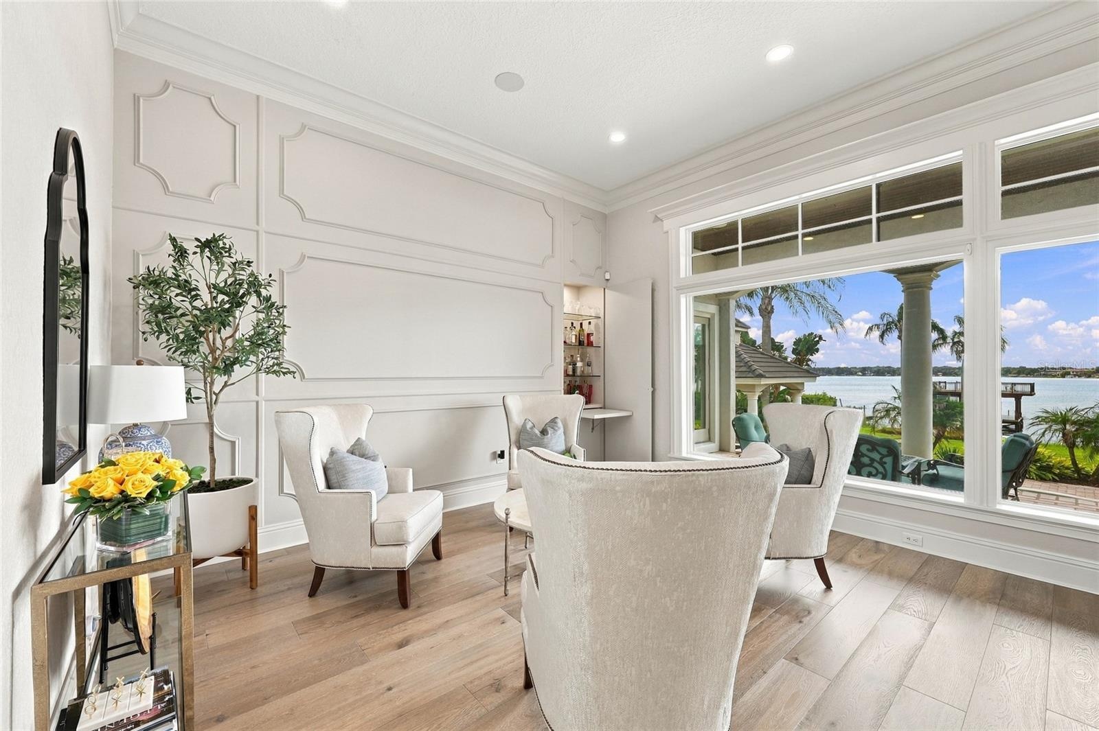 FORMAL SITTING AREA WITH HIDDEN BAR