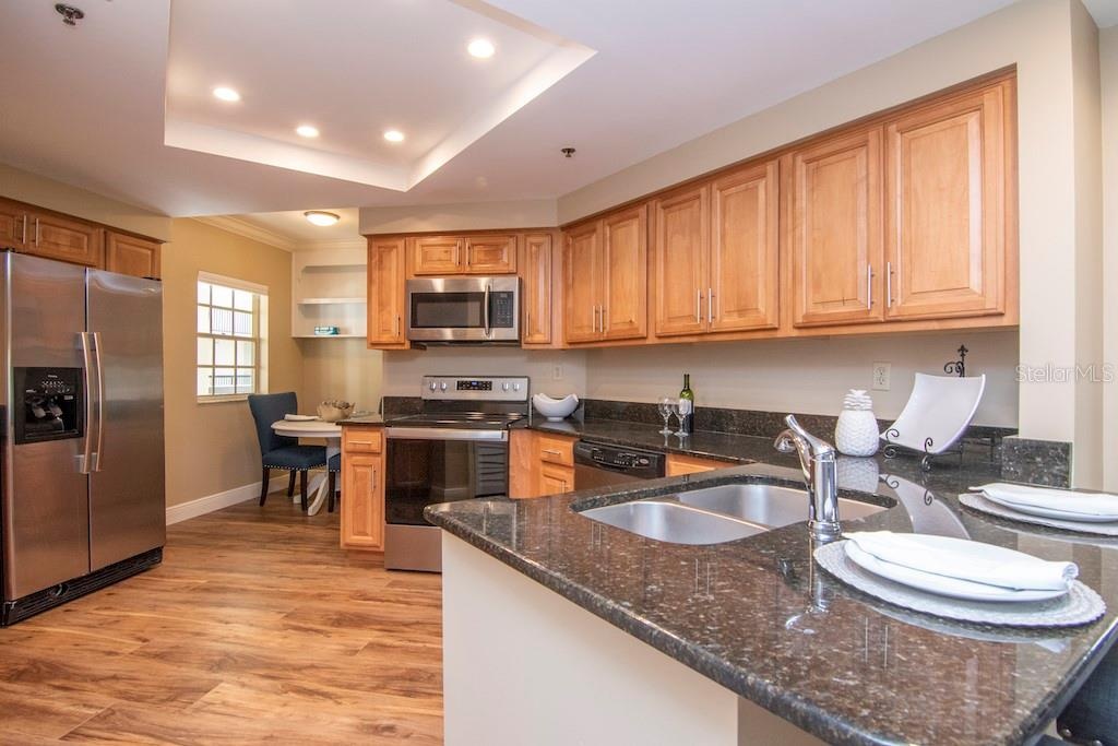 The kitchen includes a distinct eat-in area that easily converts to additional pantry and storage space to suit your lifestyle.