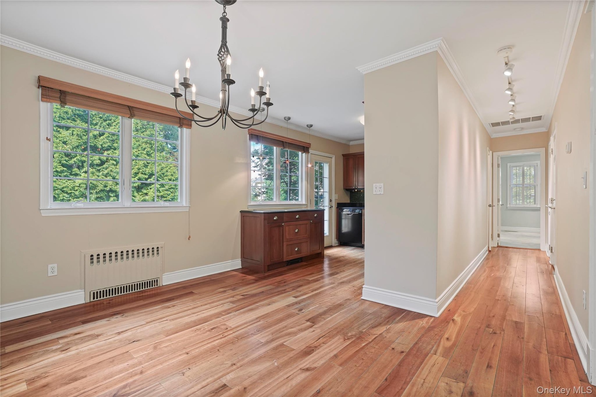 Hallway Leads To First Floor Primary Bedroom With En Suite Bathroom + Powder Room
