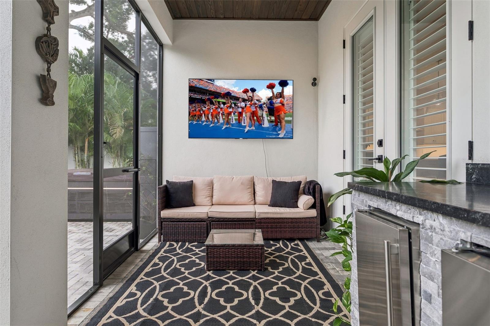 back porch (virtually staged TV)