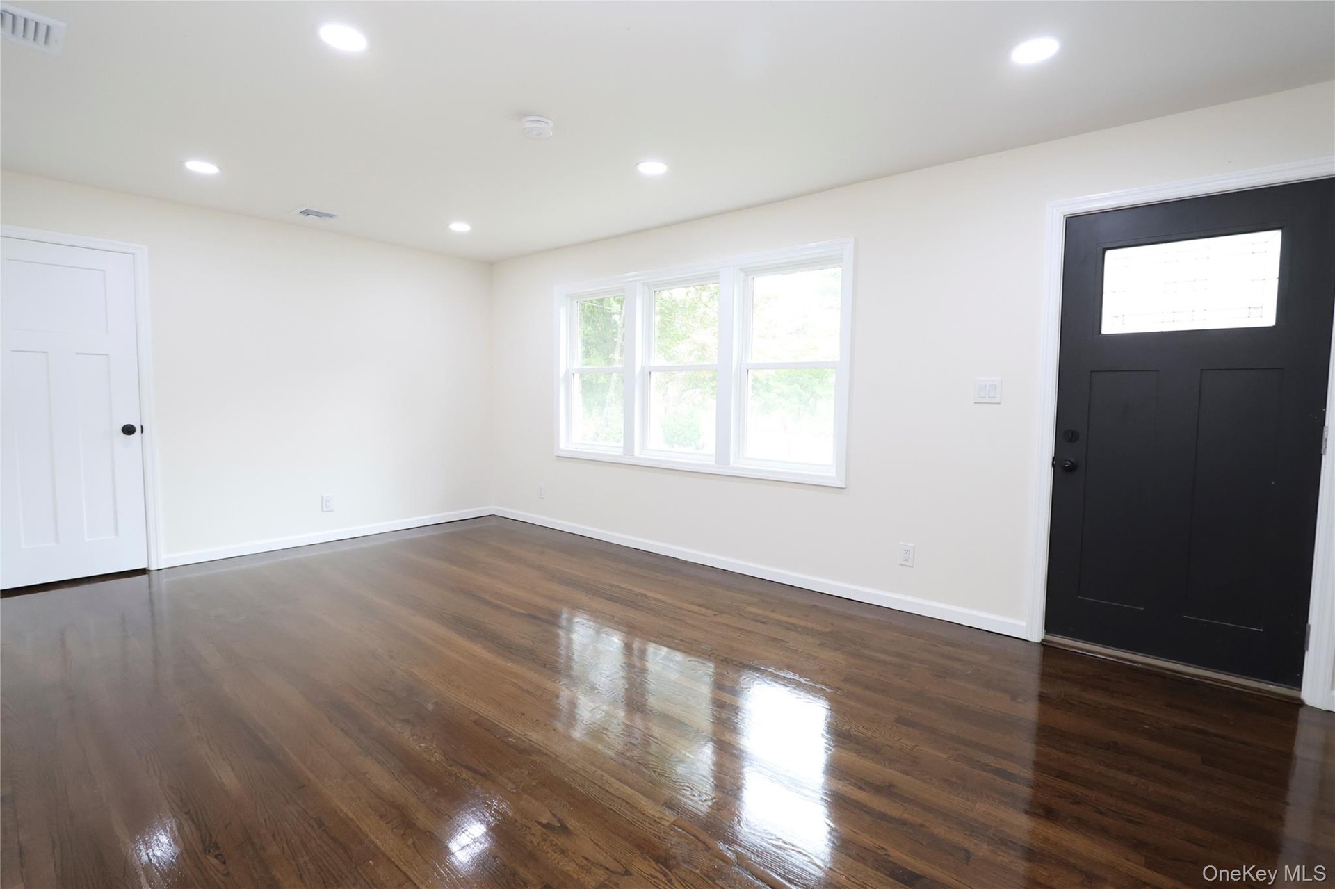 Rich wood-finish flooring with a high-gloss finish