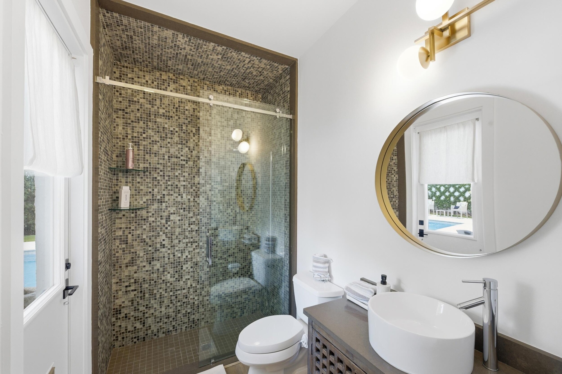 Updated pool bathroom in Palm Beach Polo off-season rental