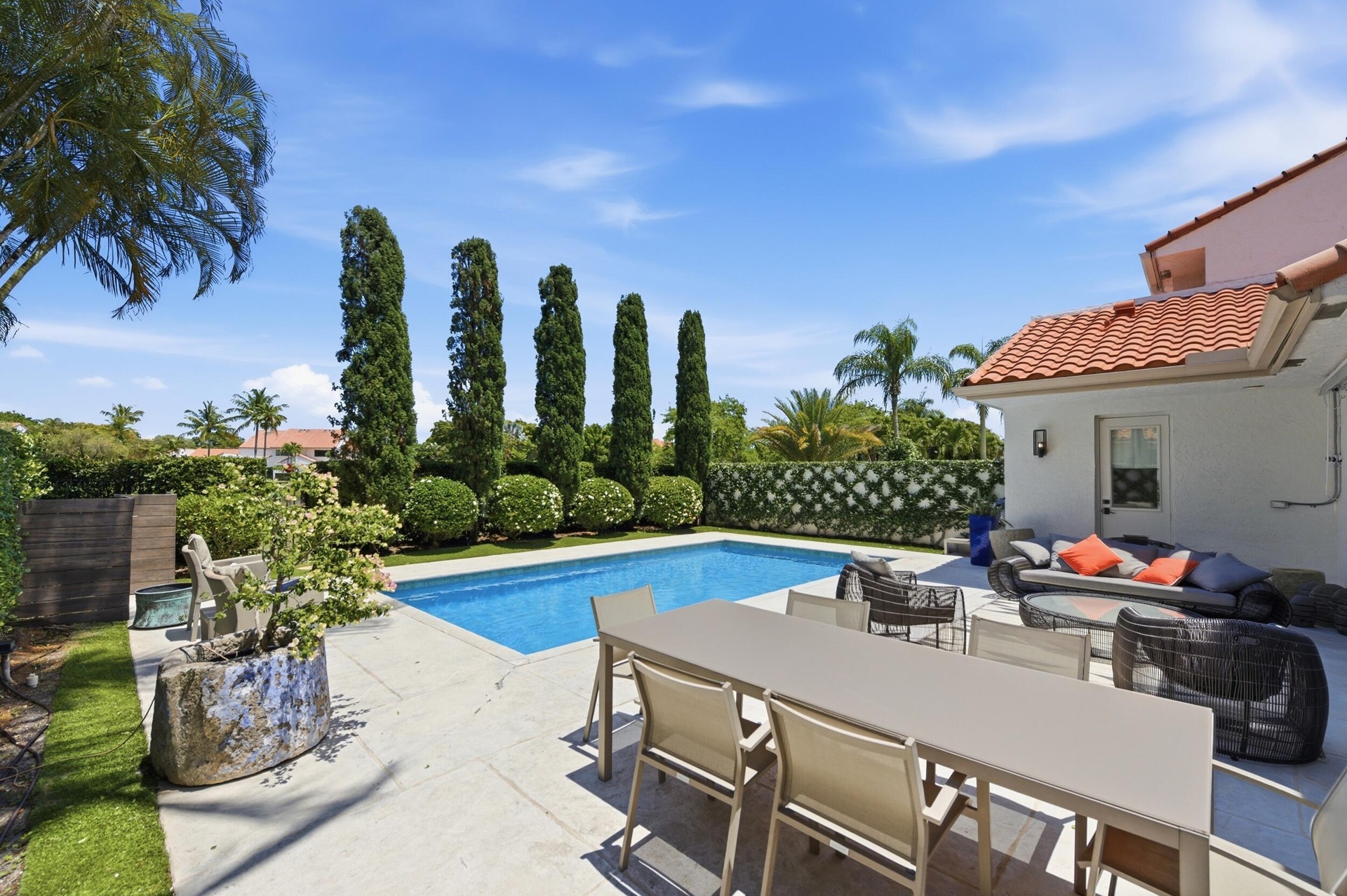 Resort-style backyard with pool at 2552 Sheltingham Drive Wellington FL rental