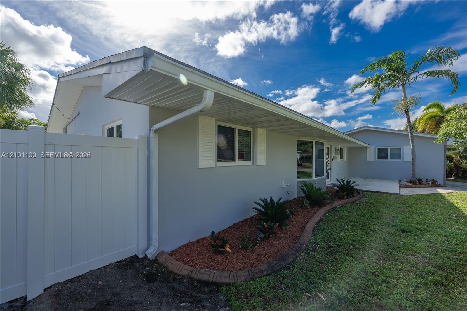 Facade of the house featuring brand new Brand new Fence