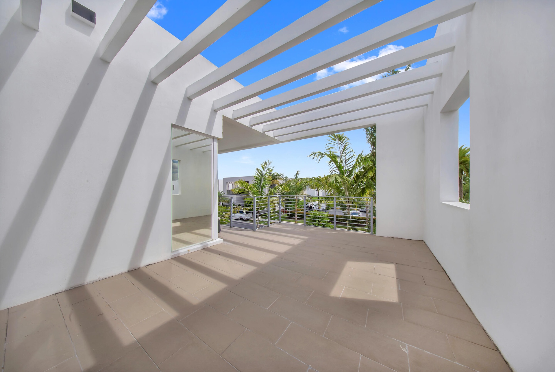 OUTDOOR BALCONY WITH A VIEW OF THE CLUB HOUSE
