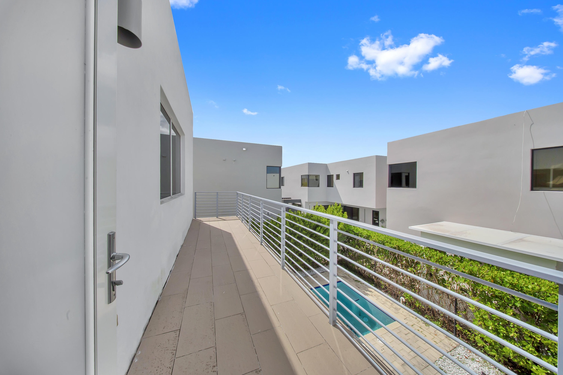 OUTDOOR BALCONY BACK OF THE HOUSE