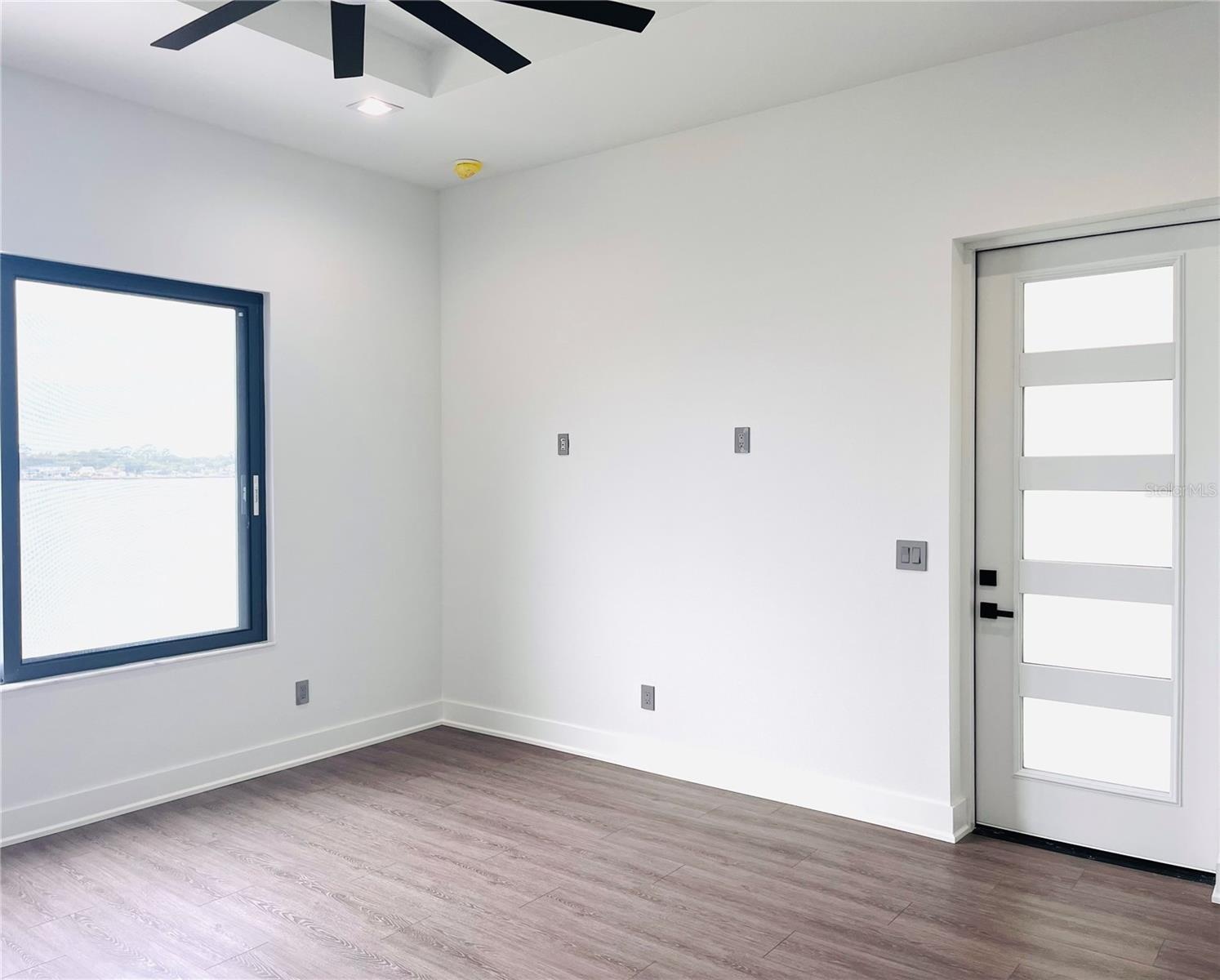 PRIMARY ENSUITE W/DOOR ACCESSING BALCONY