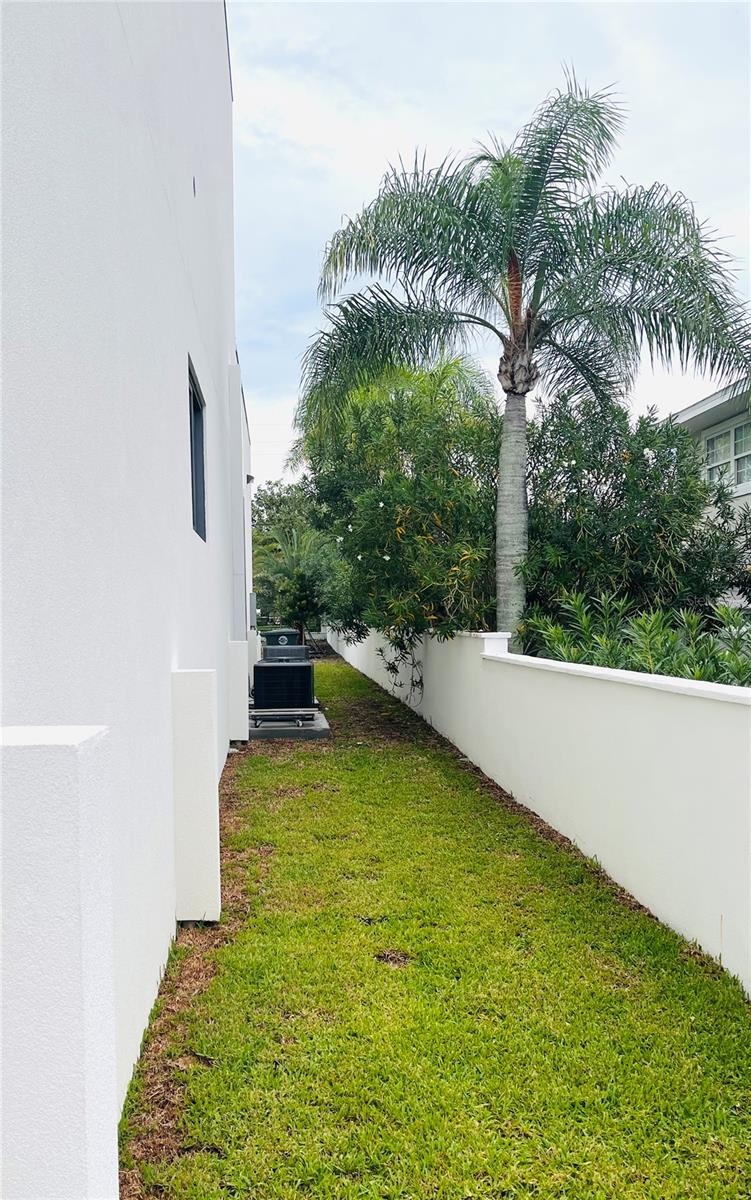 SOUTH SIDE WITH SURROUNDING WALL