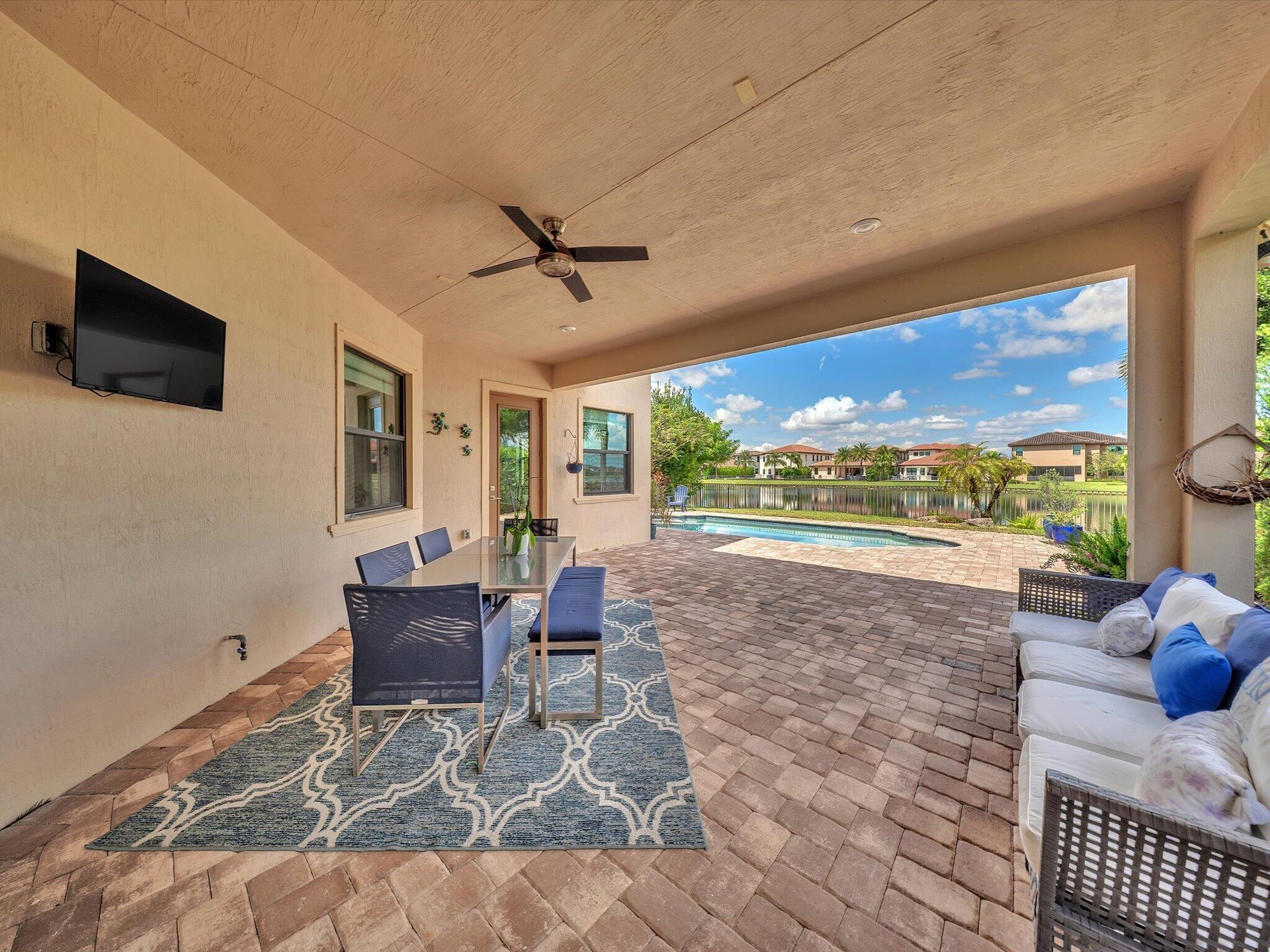 Outside Patio view with pool and lake