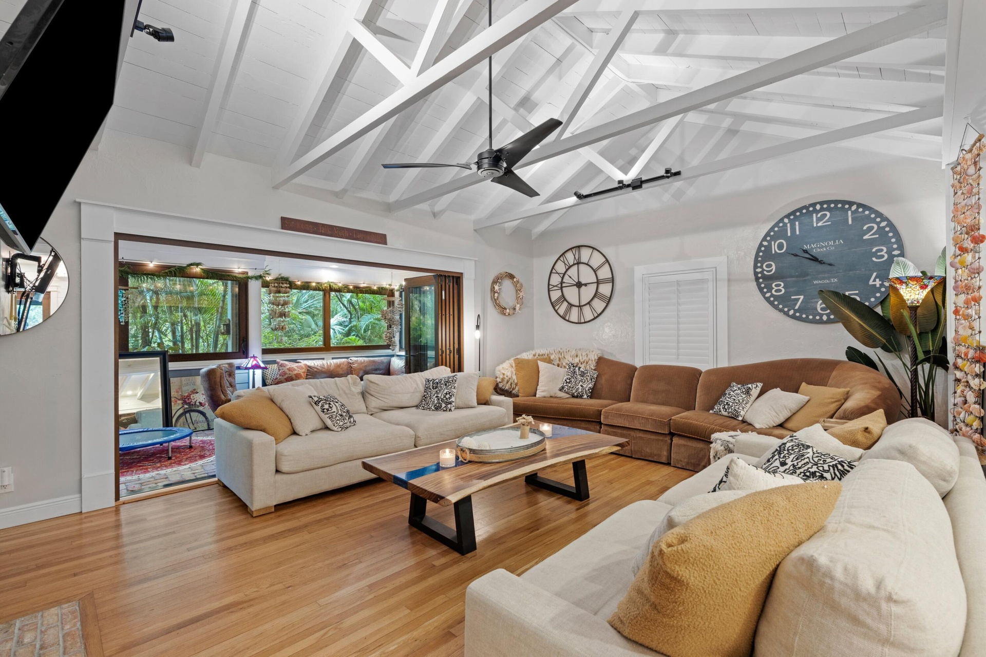 Living room, with open beam ceiling.