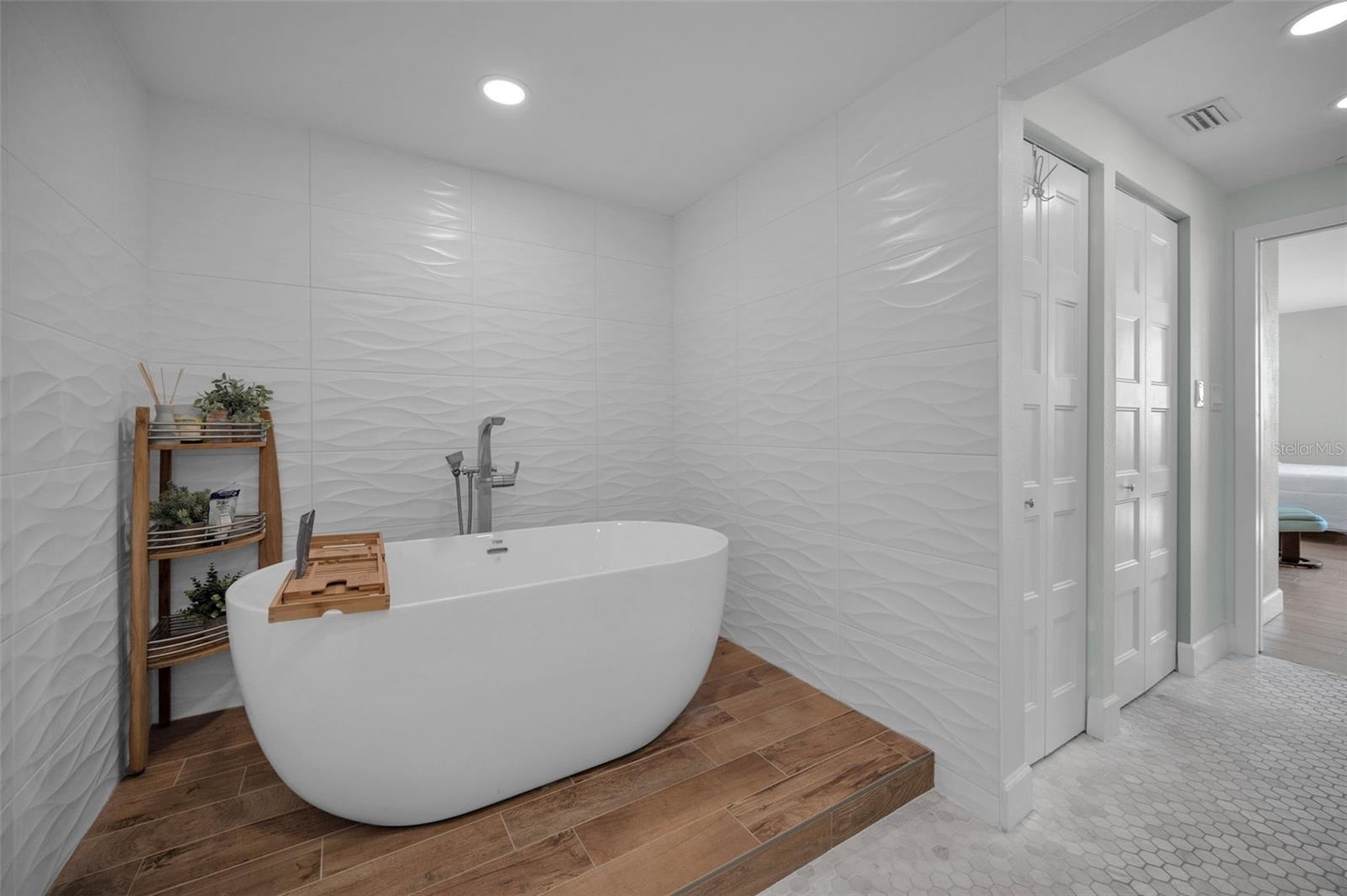 Master Suite Retreat Scenic Surround to Aquamarine Panorama Features Therapeutic Bath including, Dual Sink Vanity, Walk In Closet Dress Area & Spaciou