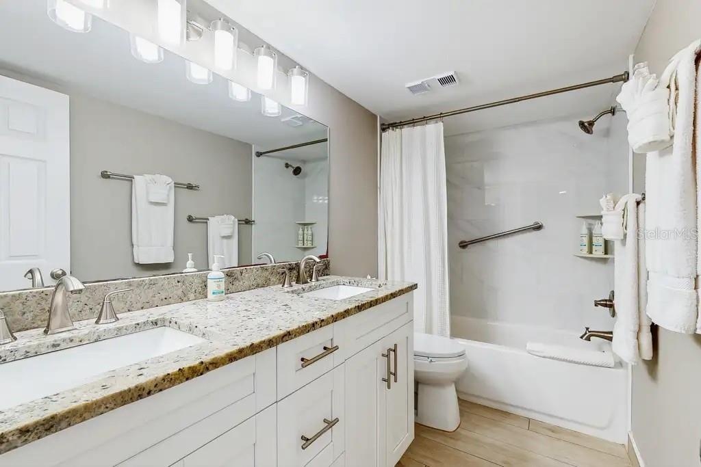 2ND BATHROOM HAS BEEN COMPLETELY REMODELED AND FEATURES A FULL TUB.