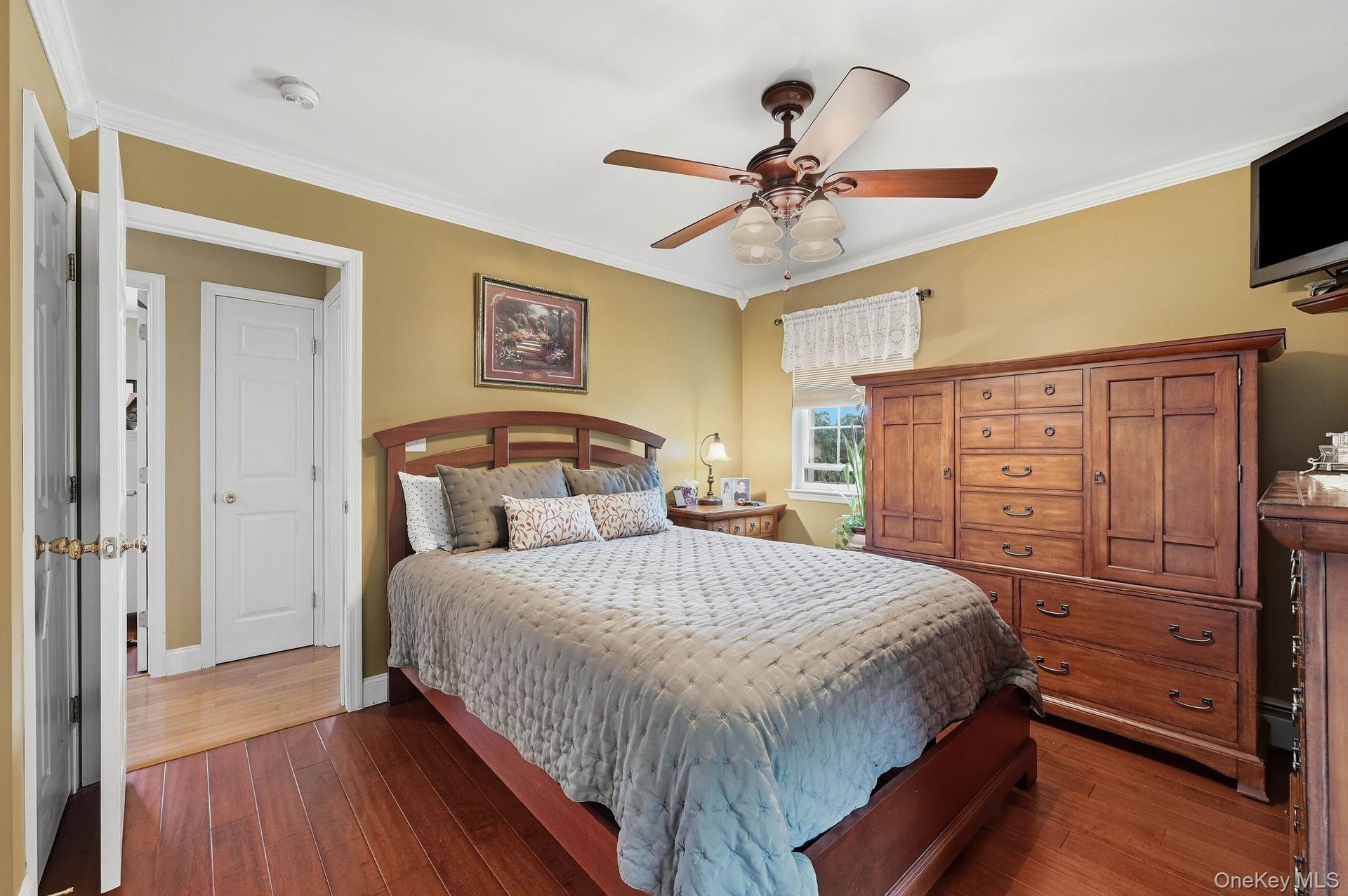 A spacious primary bedroom designed as a comfortable retreat at the end of the day.