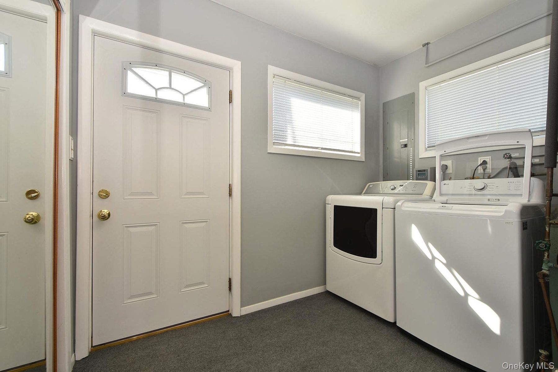 Laundry Room with storage closet