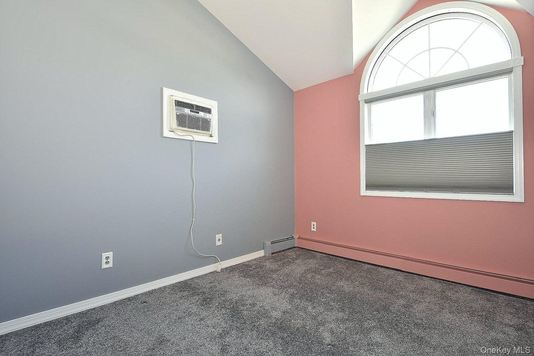 Bedroom 3 with vaulted ceiling