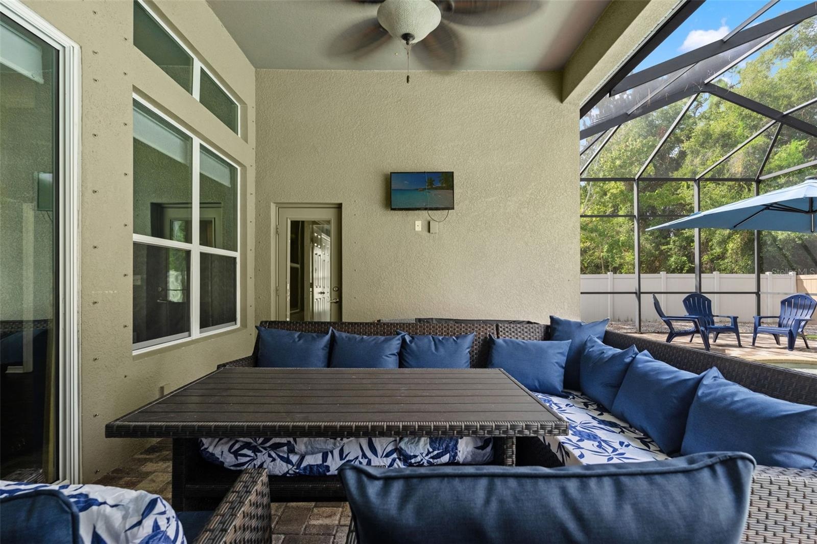 Ceiling fans and a generous covered area make the lanai a comfortable place to relax even when you’re taking a break from the sun.