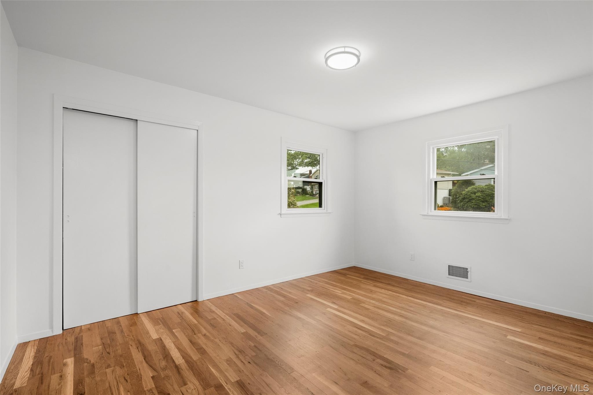 2nd upstairs bedroom with 2 exposures.