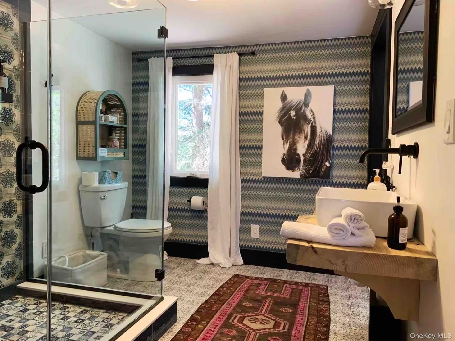 The hall bathroom and private entrance off secondary bedroom