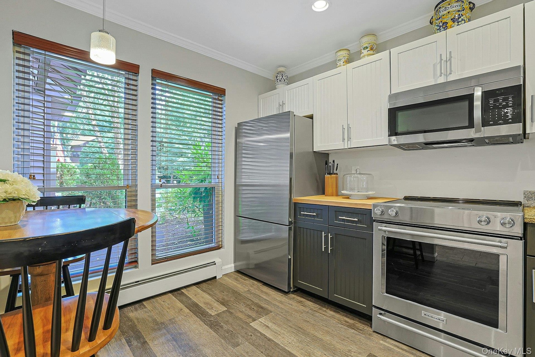 Granite and butcher block counters. Large windows and stainless steel appliances.