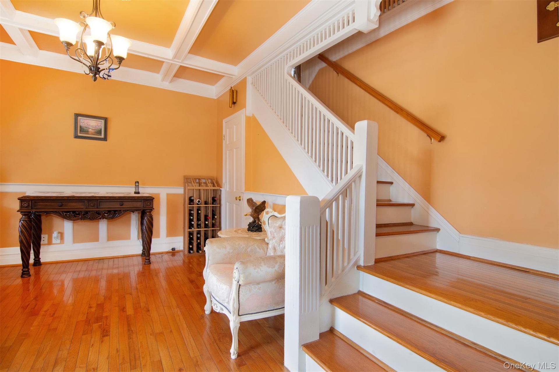 A grand original stair case with a unique design graces the foyer