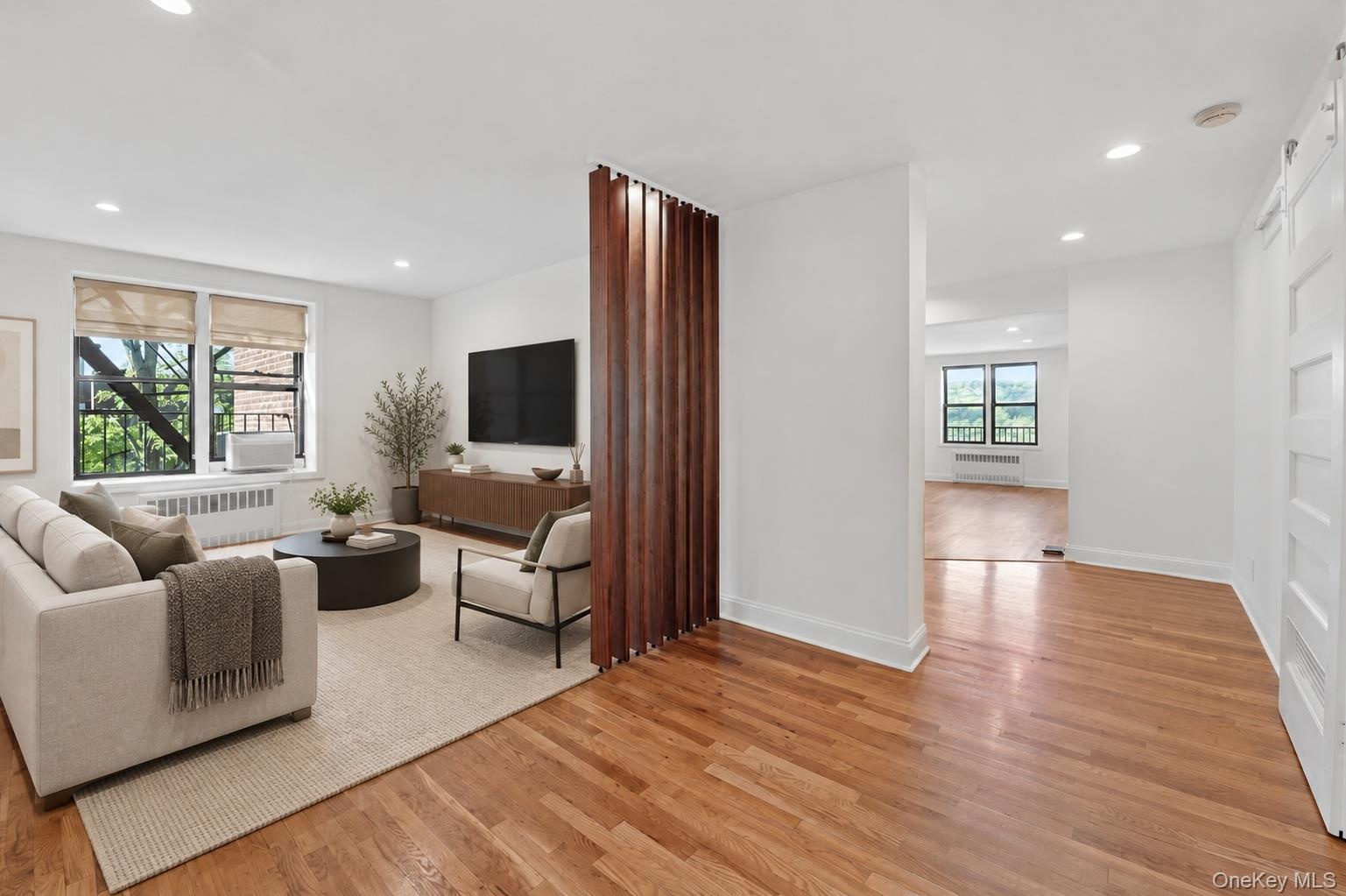 Den/home office is ideally situated off entry hall (virtually staged).