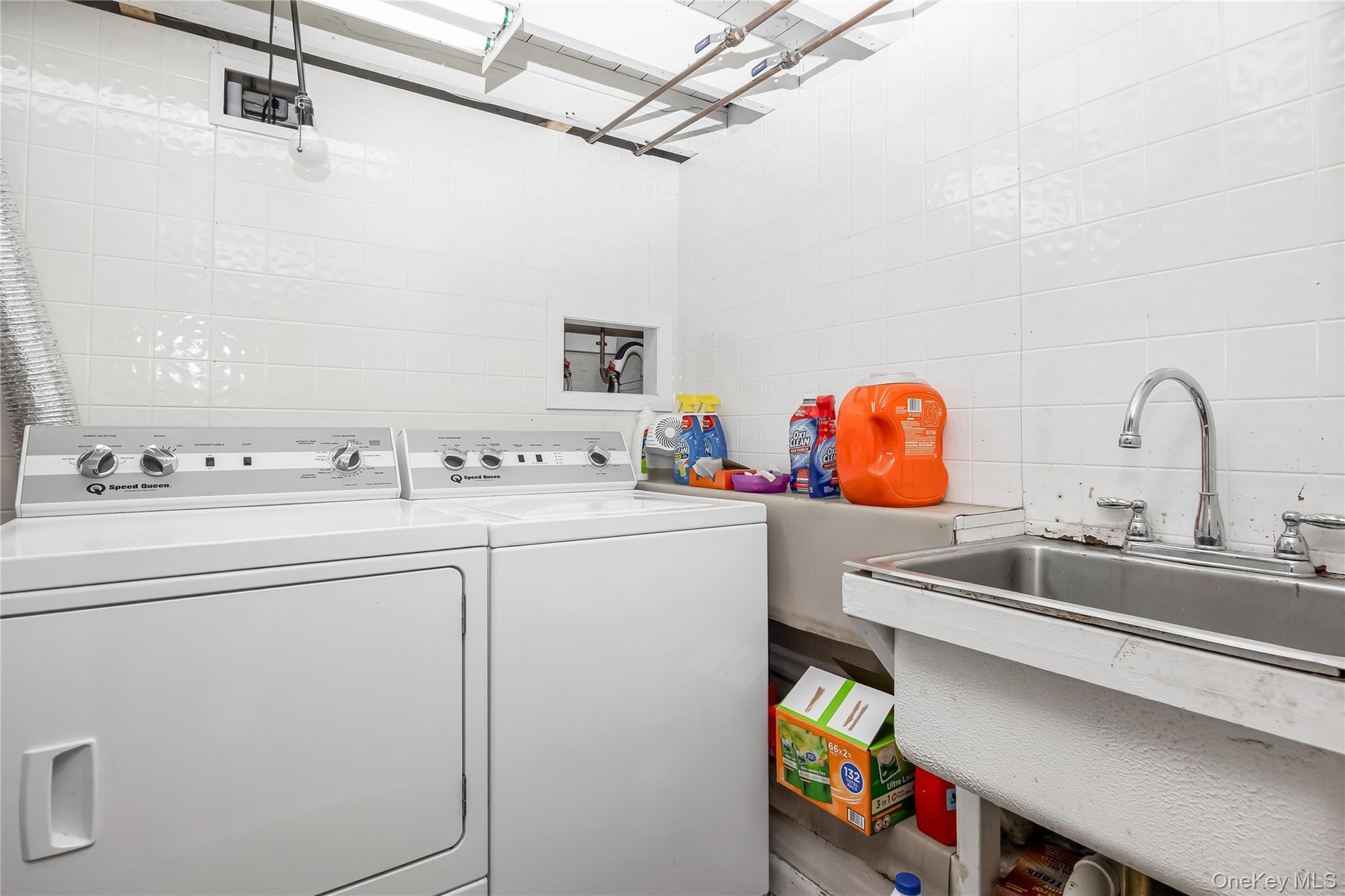 Laundry room located in basement.