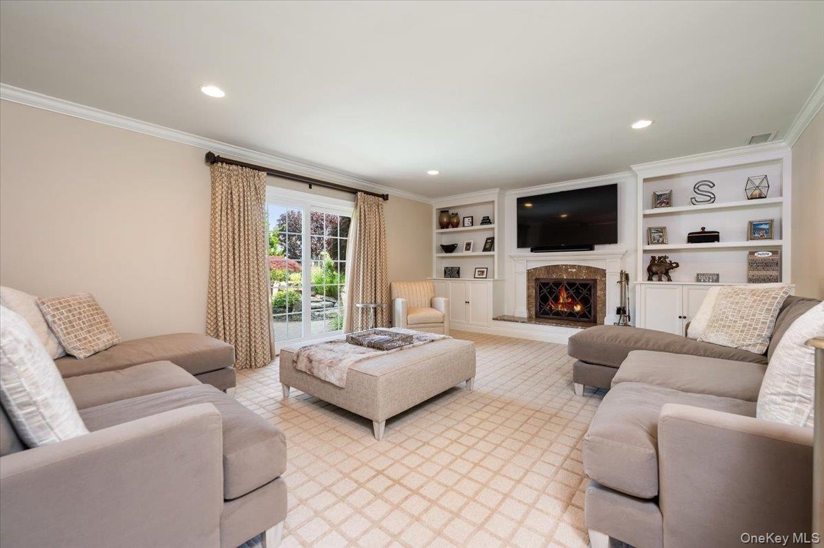 Spacious Entertainment Room with Wood burning fireplace