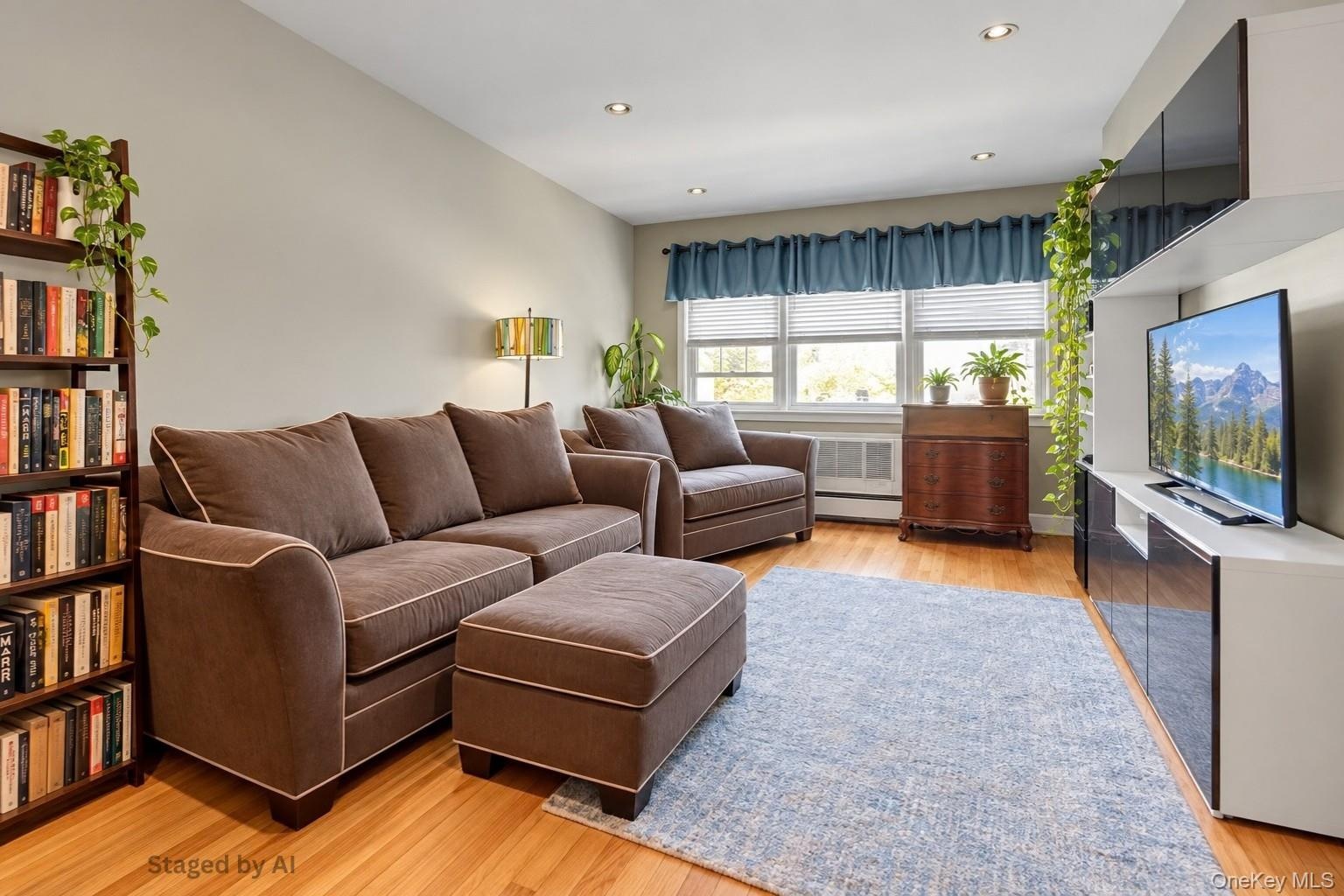 Hardwood flooring throughout, recessed ceiling lighting