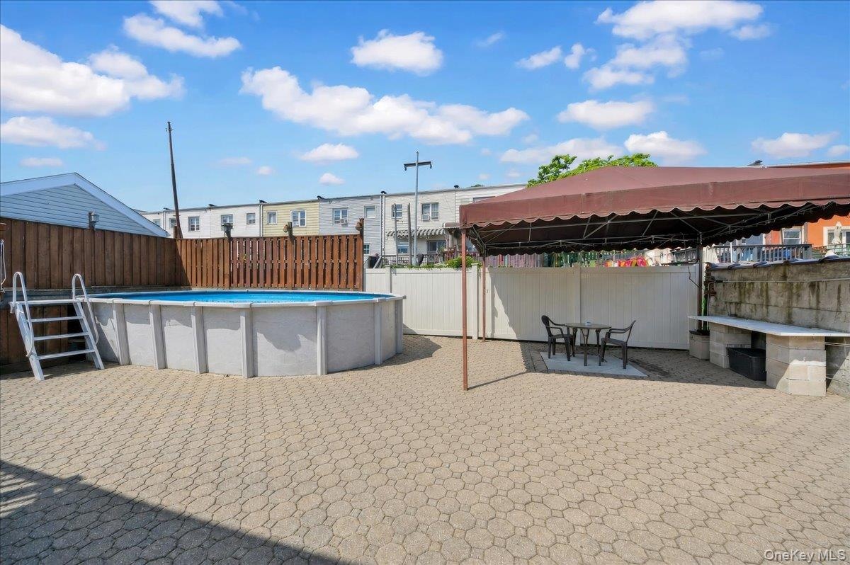 Above ground pool and deck