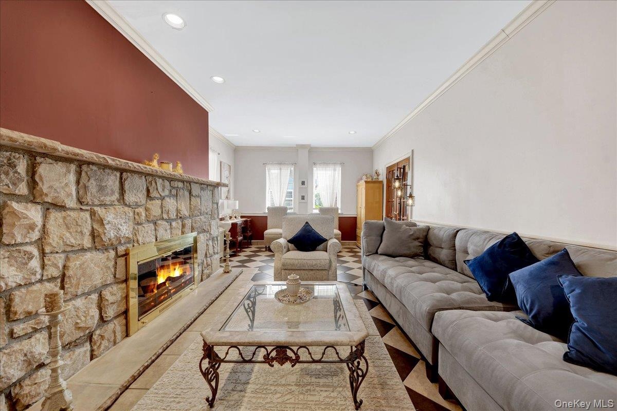 Grand living room with wood burning fireplace