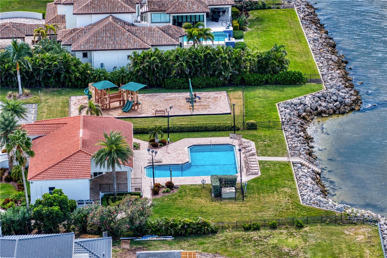 Enjoy sunset views from the community pool and clubhouse.