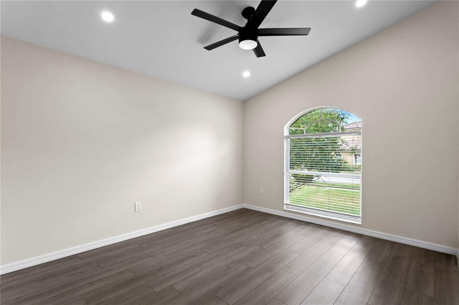 This bedroom is a private retreat with an en-suite bathroom.