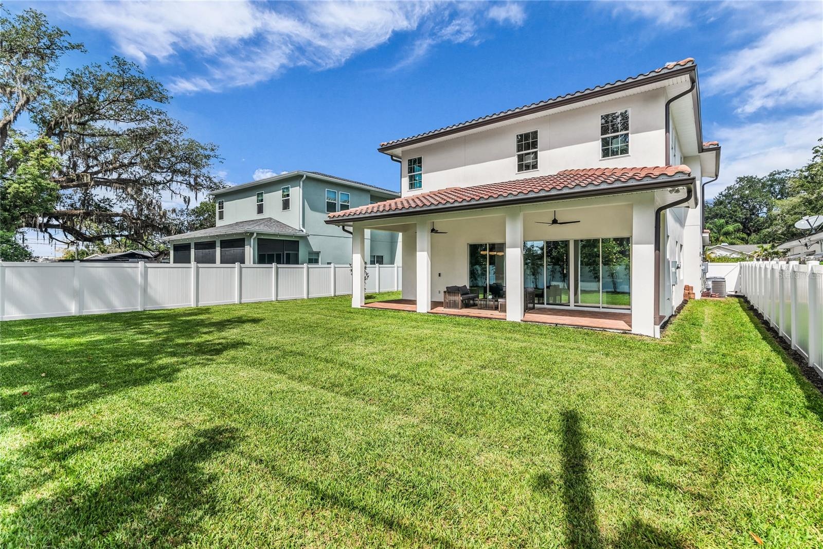 EXPANSIVE OVERSIZED YARD.