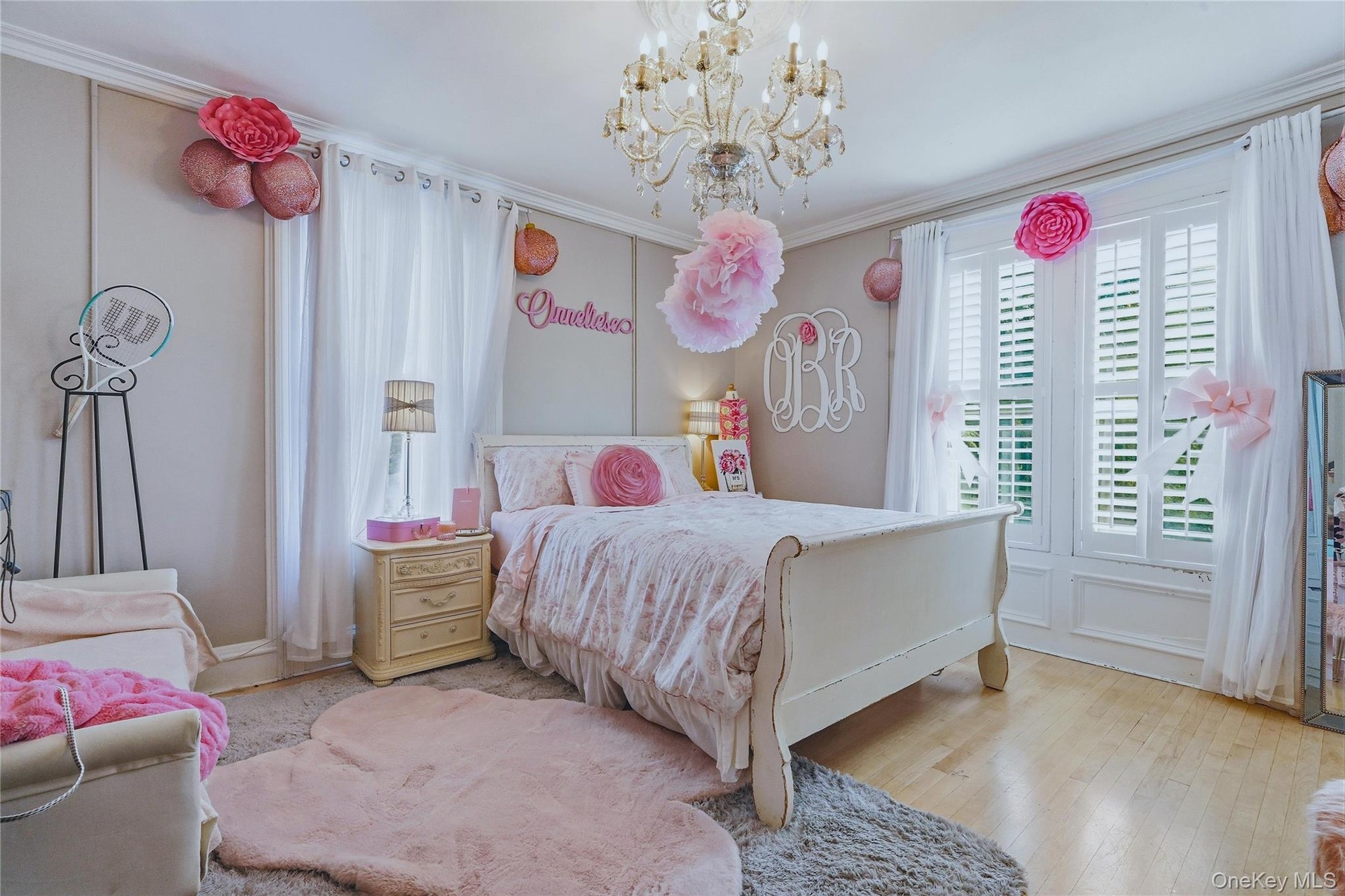 Recessed lighting, wood-finish flooring, and crown molding