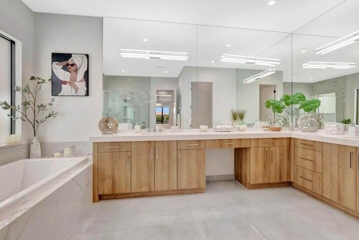 Fully redesigned chef’s kitchen with an expanded custom island, premium cabinetry, and finishes not offered by the original builder.