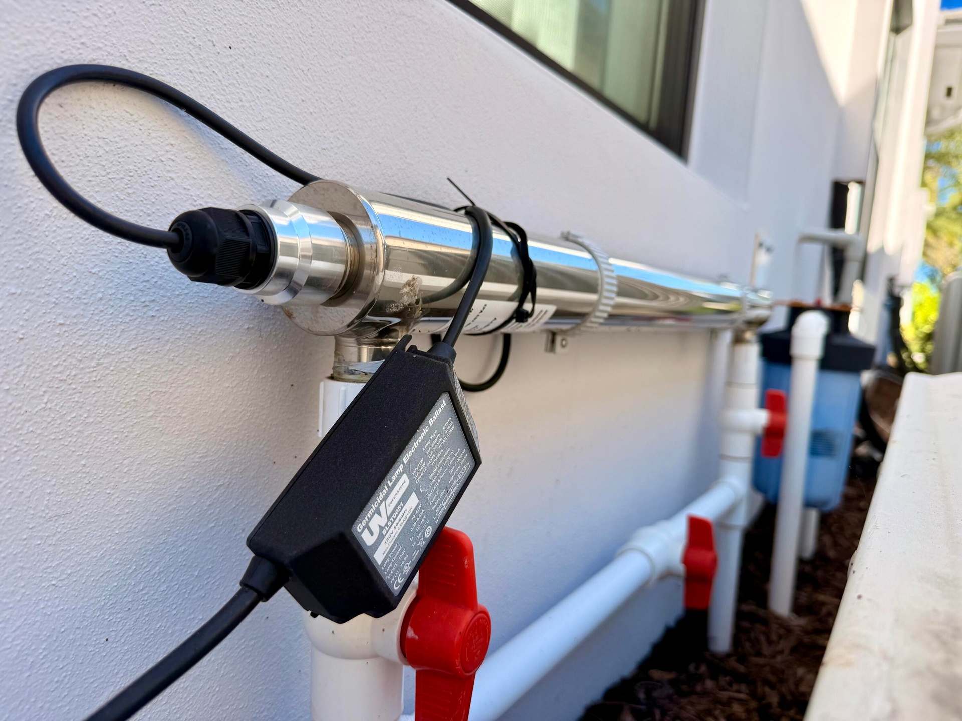Infrared water conditioning component integrated into the home’s water filtration system, designed to enhance water quality and reduce mineral buildup