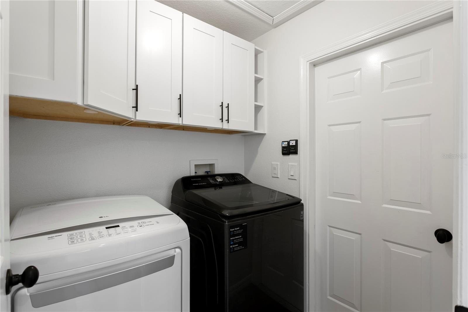 Dedicated laundry room conveniently located off the kitchen and garage.
