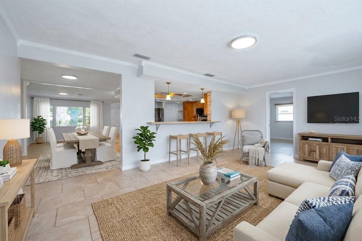 Virtually Staged Family Room looking into the Kitchen