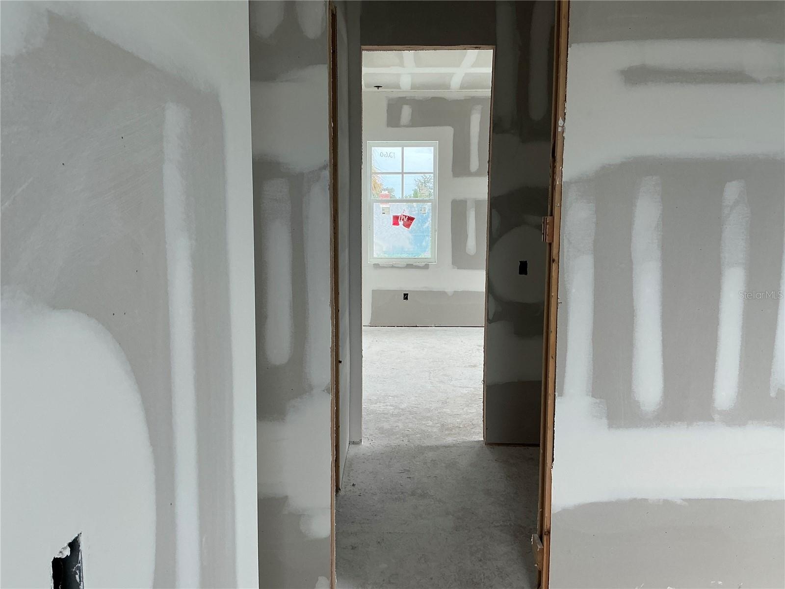 Bedroom view going into shared bath