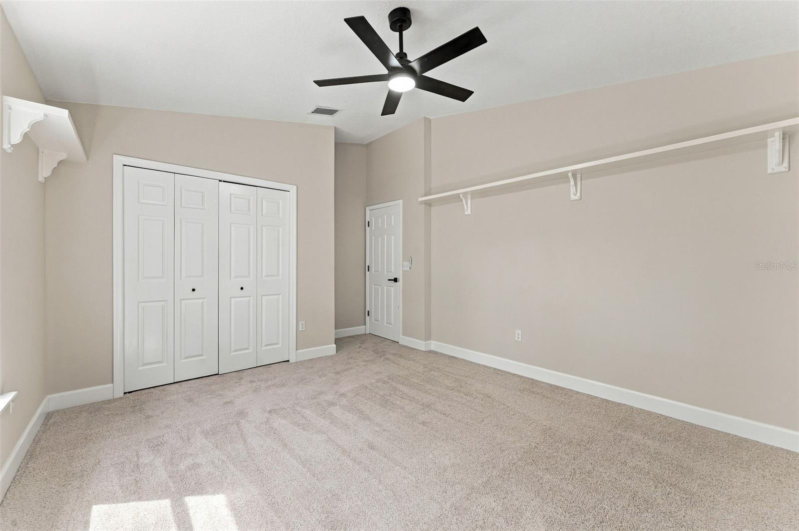 Bedroom 2 with a large wall closet and plenty of space