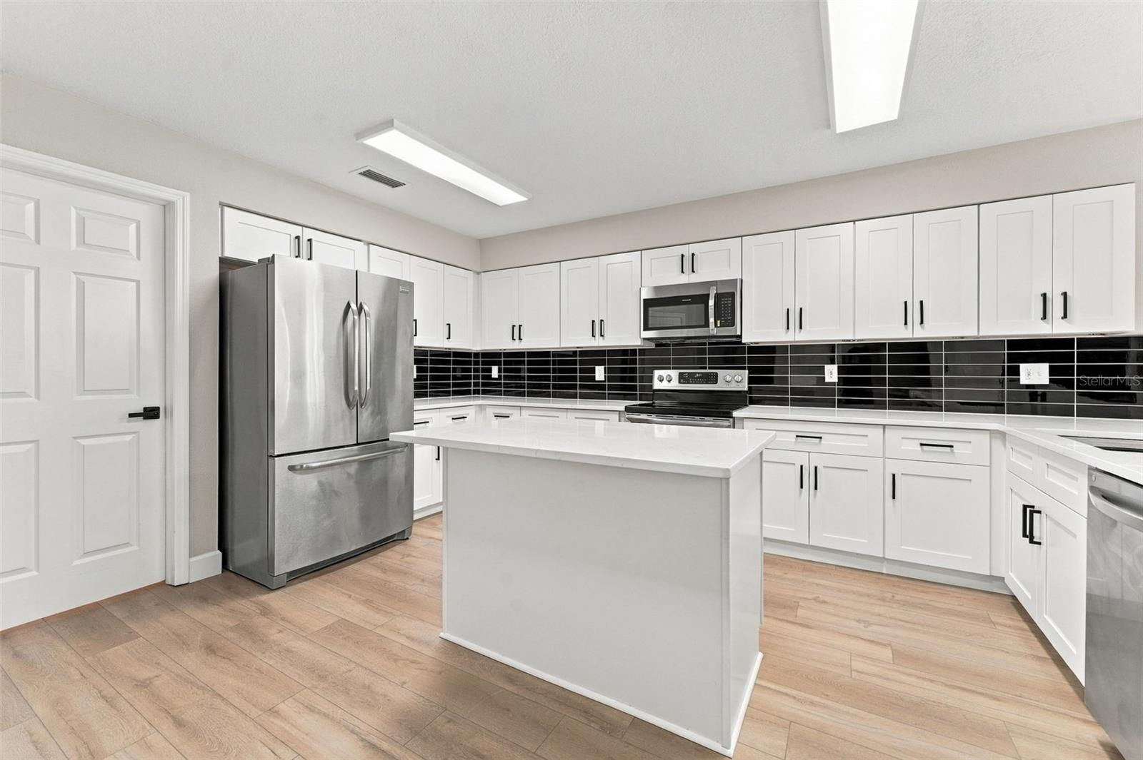 New shaker style white cabinets for all your kitchen storage needs
