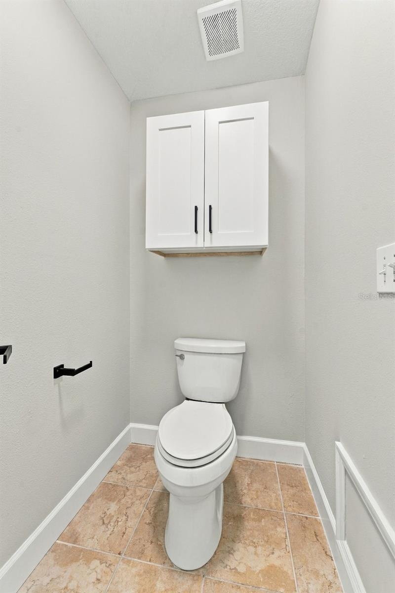 Private water closet in primary bathroom