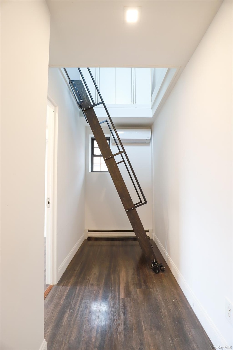 Rolling stairs leading up to the attic