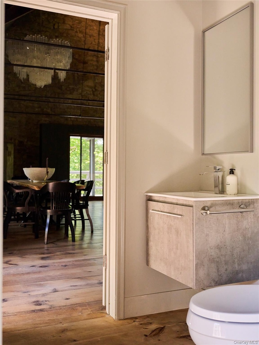 Bathroom featuring vanity and hardwood / wood-style flooring