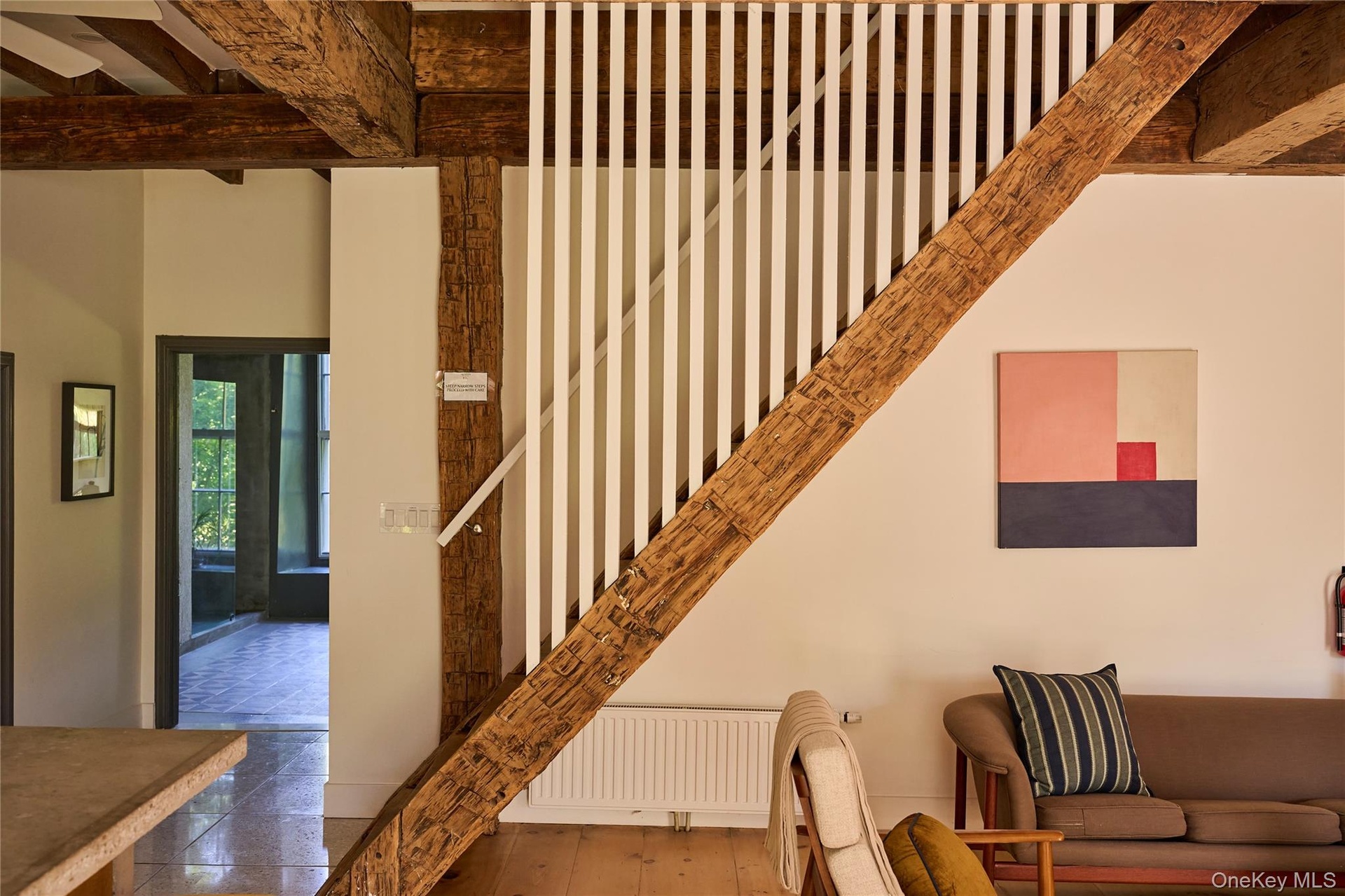 Stairway with beamed ceiling