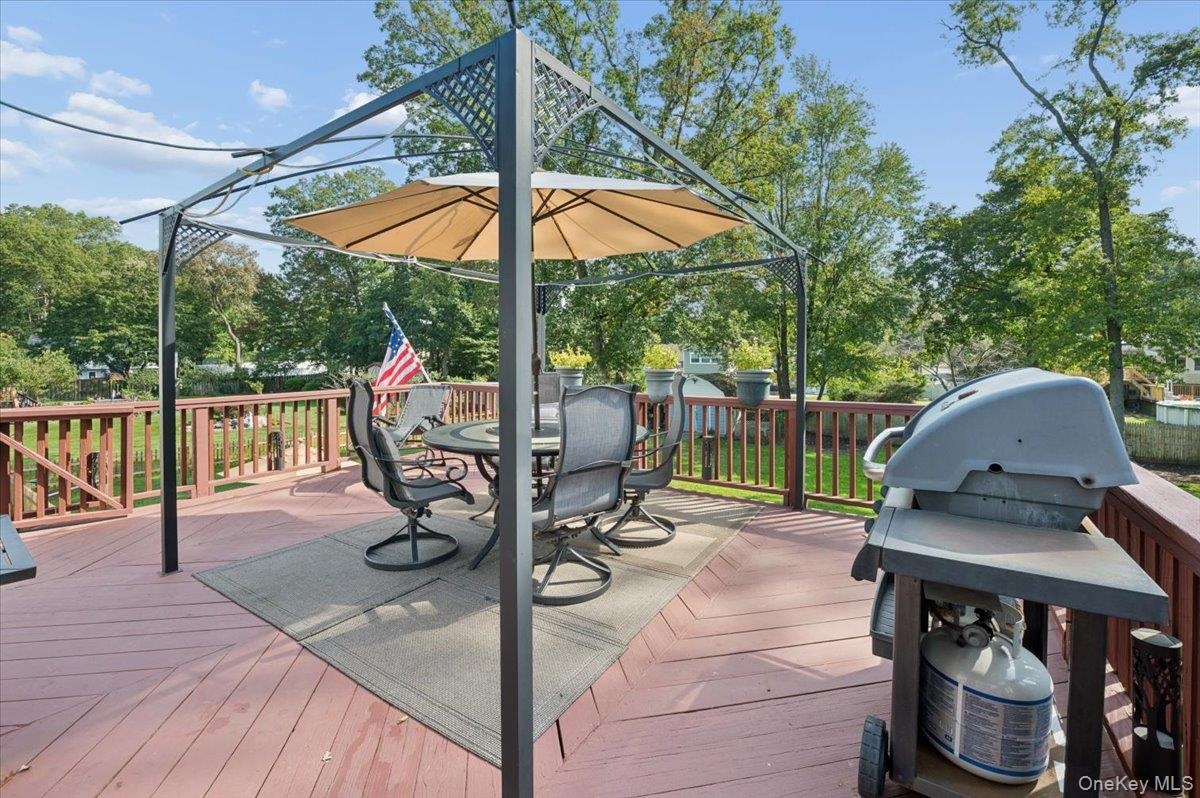 Huge deck overlooking your stunning backyard.